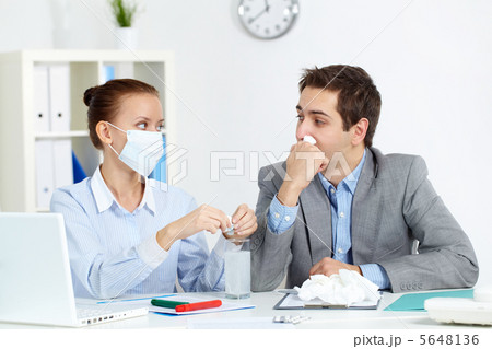 Taking medicine in office Taking medicine in office 5648136