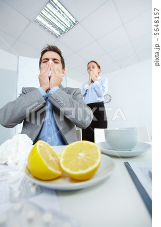 Man sneezing 5648157