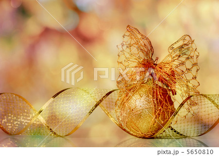 Christmas decoration on defocused lights background Christmas decoration on defocused lights background 5650810