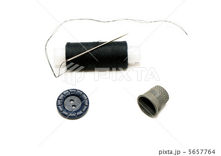 Thread with a needle and a thimble Thread with a needle and a thimble 5657764