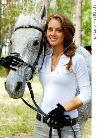 Girl and horse 5692335