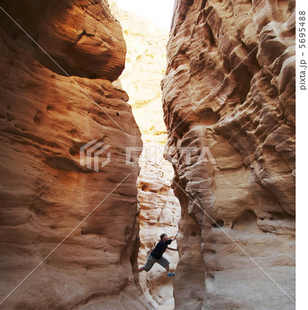 Climber in canyon 5695488