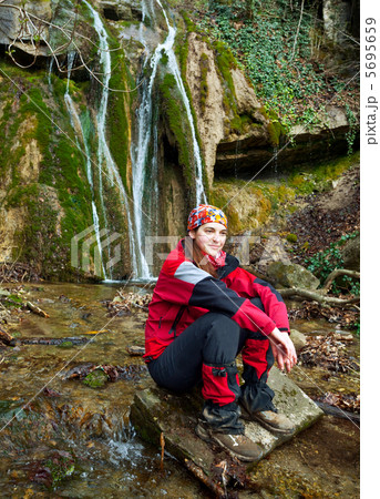 Girl near waterfall 5695659