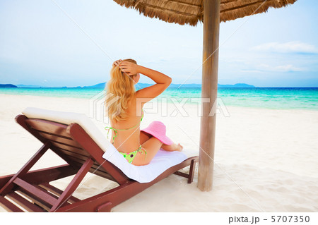 Woman sunbathing Woman sunbathing 5707350