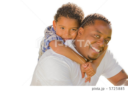 Mixed Race Father and Son Playing Piggyback On White Mixed Race Father and Son Playing Piggyback On White 5725885
