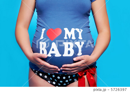 Hands on belly 5726397