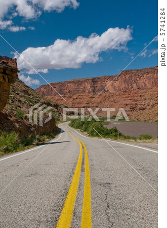 vibrant image of highway and blue sky 5741284