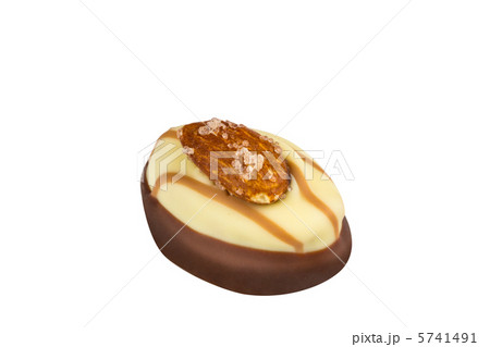 Chocolate morsel on white background Chocolate morsel on white background 5741491