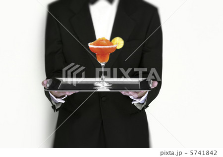Manhattan Cocktail Being Served by Waiter on Silver Tray 5741842