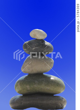 The stack of pebble stones in zen concept  on blue 5784369