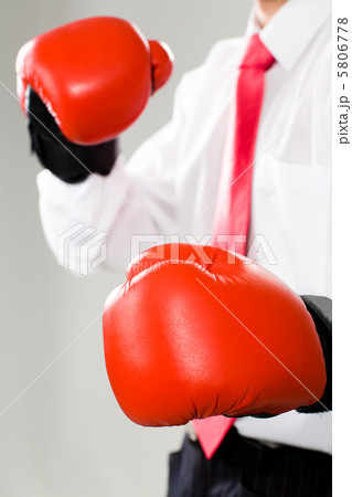 A man in boxing gloves 5806778