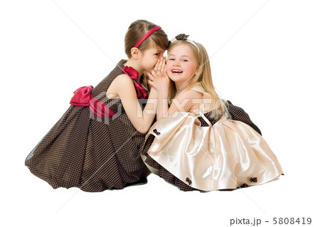 Two little girls talking. Isolated Two little girls talking. Isolated 5808419