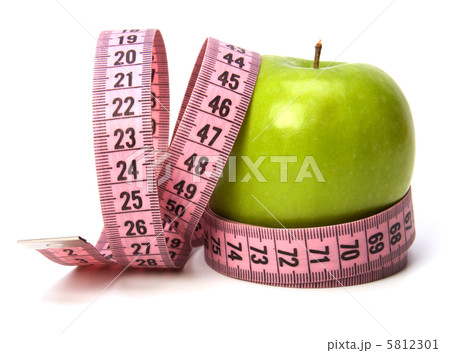 tape measure wrapped around the apple isolated on white backgro tape measure wrapped around the apple isolated on white backgro 5812301