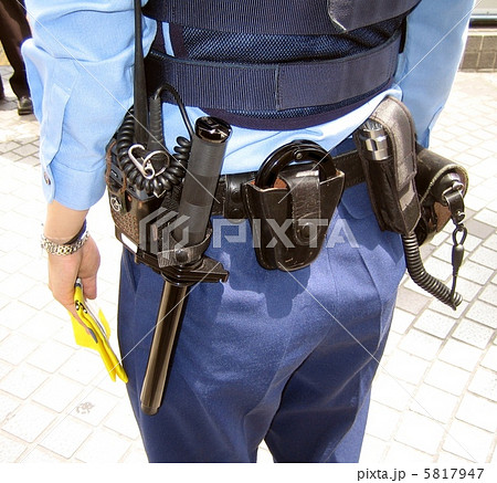 女性警察官の装備品の写真素材