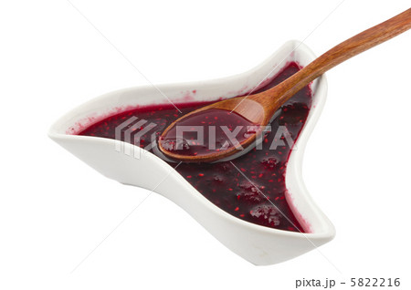 raspberry jam in a wooden spoon raspberry jam in a wooden spoon 5822216