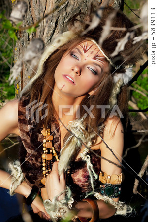Sexy tribal female with tottoo on her face Sexy tribal female with tottoo on her face 5839113