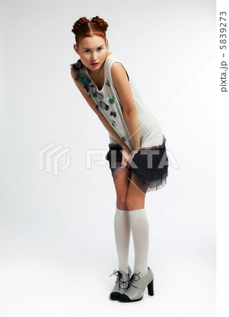 Fashion asian redhaired girl wearing modern dress 5839273