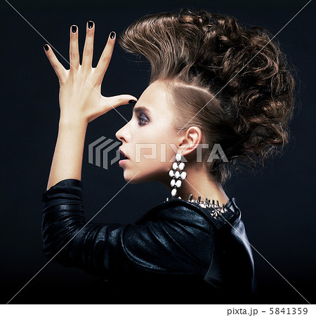 Beauty woman with pigtails, creative hairstyle, saluting 5841359