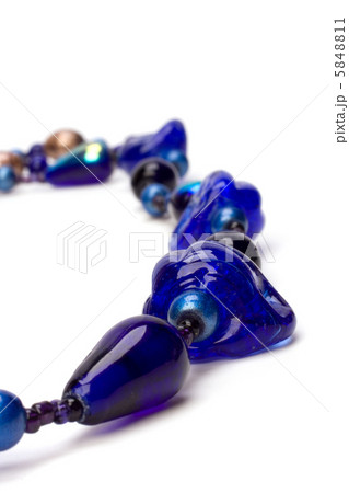 blue beads isolated on white background 5848811