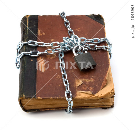 tattered book with chain and padlock isolated on white backgroun tattered book with chain and padlock isolated on white backgroun 5848908