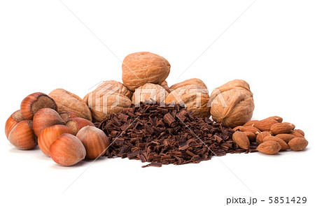 grated chocolate and nuts isolated on white background grated chocolate and nuts isolated on white background 5851429