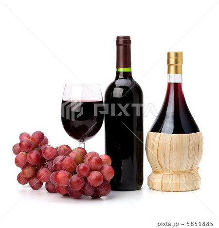 Full red wine glass goblet, bottle and grapes 5851885