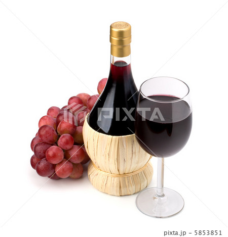 Full red wine glass goblet, bottle and grapes 5853851