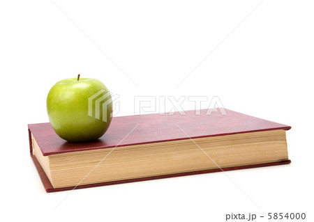 book with apple isolated on white background 5854000