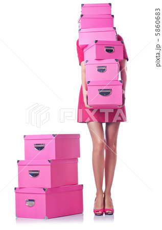 Woman with stack of giftboxes Woman with stack of giftboxes 5860683
