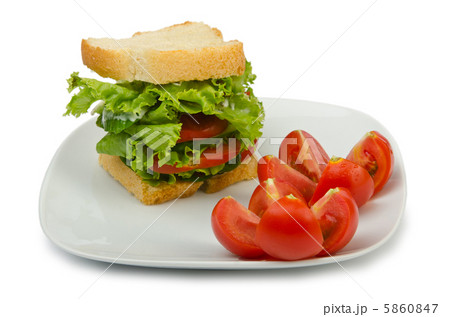 Tomatoes and cucumbers on white 5860847