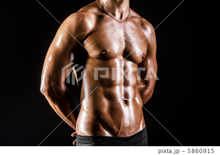 Bodybuilder with muscular body 5860915