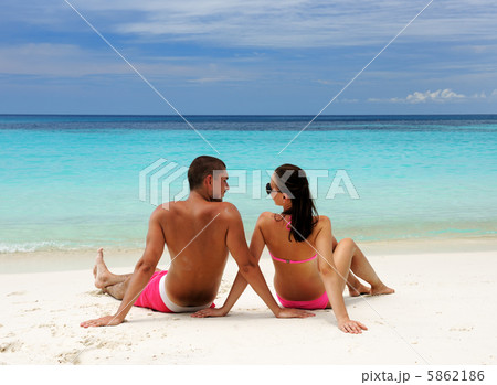 Couple on a beach 5862186