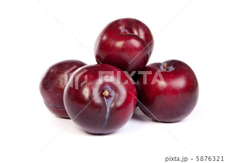Group of plums  on white 5876321