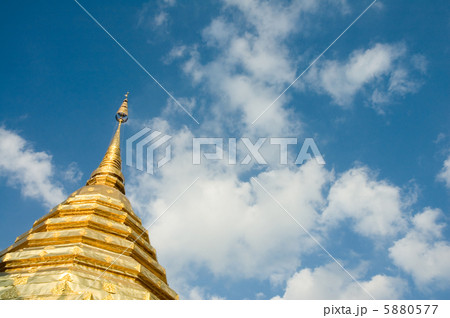 golden stupa over blue sky background with copyspace golden stupa over blue sky background with copyspace 5880577