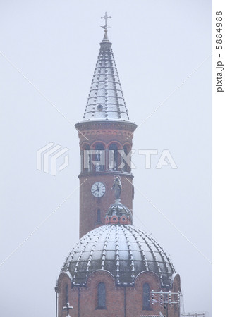 Church domes covered with snow. 5884988