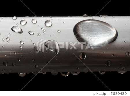 water drops on misted metal tube water drops on misted metal tube 5889429