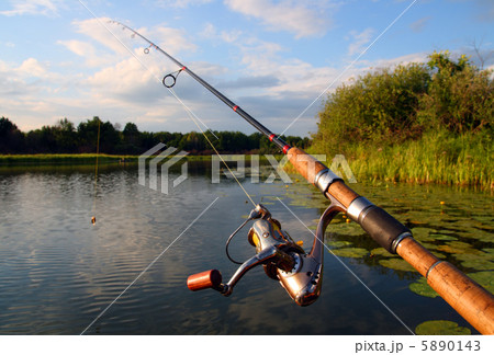 spinning and evening lake 5890143