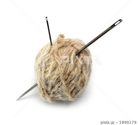 clew of wool thread and two needles 5890279