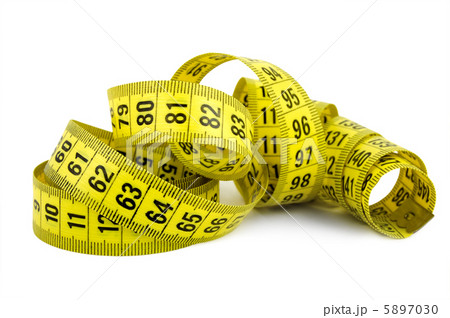 Curled yellow measuring tape on white background 5897030
