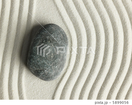 Zen stone in the sand 5899056