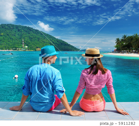 Couple at beach jetty 5911282