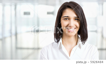 Young business woman in an office Young business woman in an office 5926484