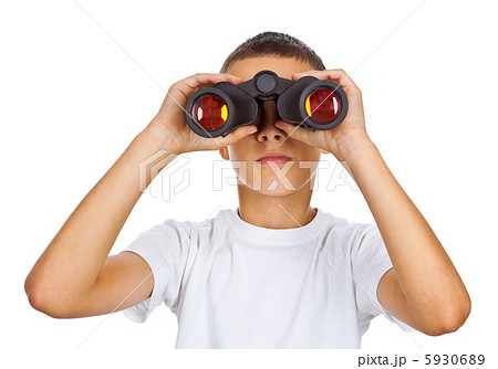 Boy looking through binoculars Boy looking through binoculars 5930689