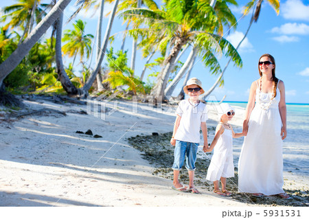 Mother and kids on a tropical vacation Mother and kids on a tropical vacation 5931531