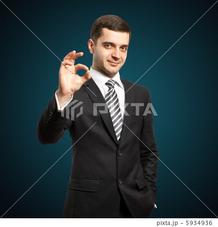 happy businessman in suit shows OK happy businessman in suit shows OK 5934936