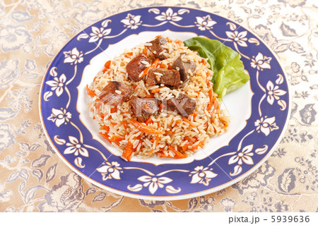 Uzbek national dish - plov on the plate Uzbek national dish - plov on the plate 5939636