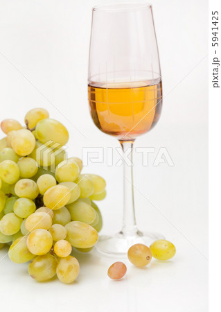 Still-life with bunch of grapes and white wine Still-life with bunch of grapes and white wine 5941425