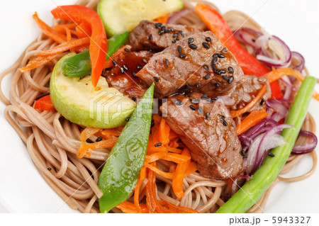 meat with vegetables and noodles meat with vegetables and noodles 5943327