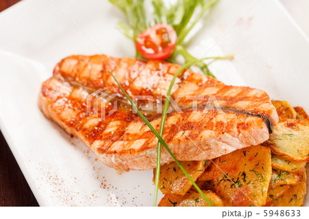 salmon steak with potatoes salmon steak with potatoes 5948633