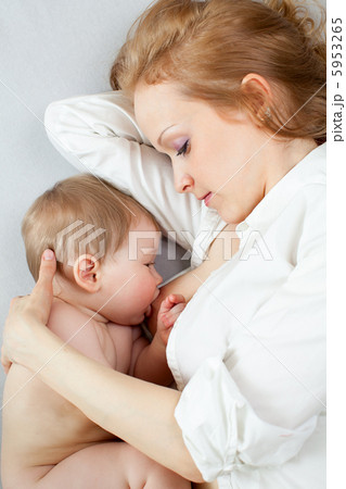beautiful mother breast feeding her baby boy beautiful mother breast feeding her baby boy 5953265